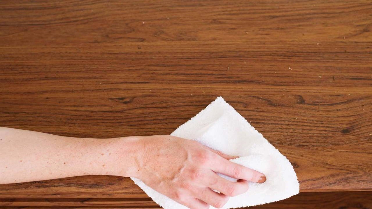 Restoration experts say a microfiber cloth soaked in this simple homemade solution can bring old wooden furniture back to an almost brand new finish